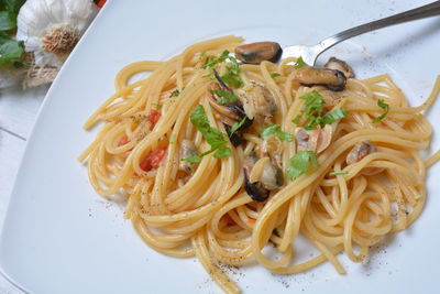 High angle view of noodles in plate on table