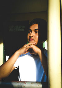 Portrait of young man looking away