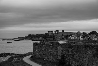 Scenic view of sea against cloudy sky