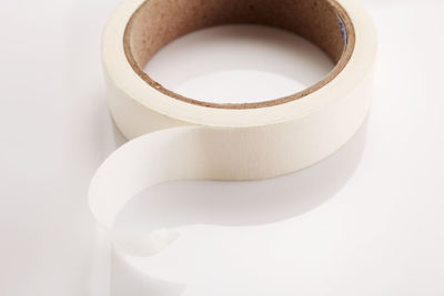 Close-up of adhesive tape against white background