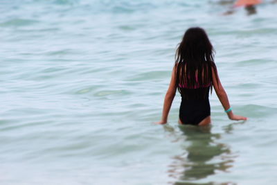 Woman standing in water