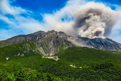 Scenic view of volcanic mountain against sky