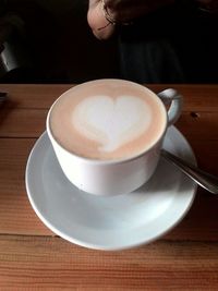 Coffee cup on table