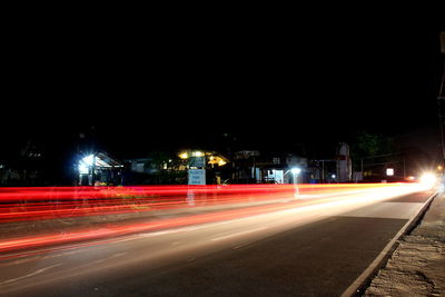 Light trails on road at night