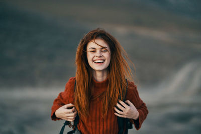 Portrait of a smiling young woman