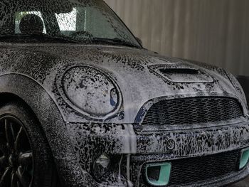 Close-up of abandoned car