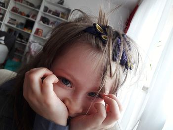 Portrait of cute girl at home