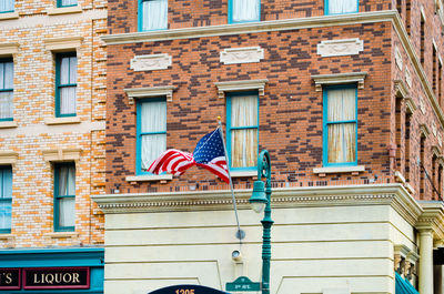 Low angle view of american flag on building