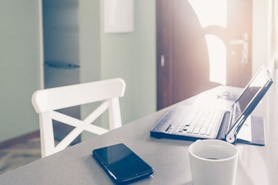 Close-up of laptop on table