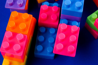 Close-up of toy blocks on blue background