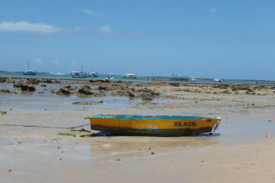 Scenic view boat on beach