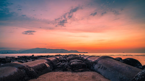 Scenic view of sea against sky during sunset