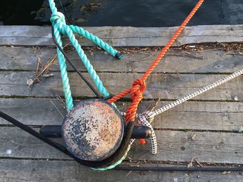 Close-up of ropes tied on a pier