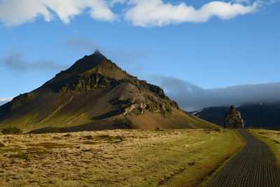 Scenic view of mountain range against sky