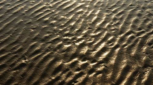 High angle view of shadow on sand