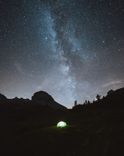 Scenic view of star field against sky at night