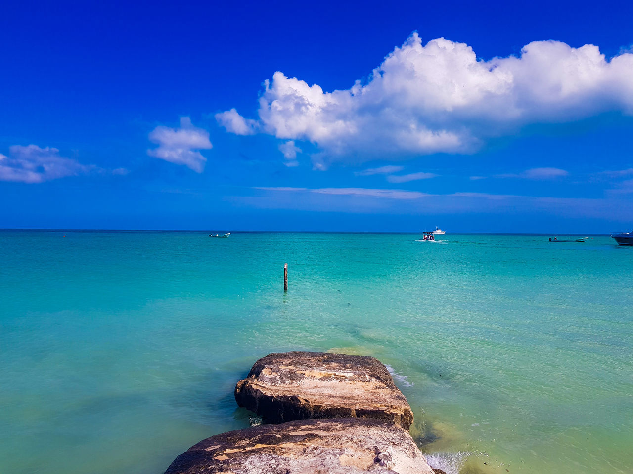 sea, water, sky, scenics - nature, beauty in nature, horizon over water, horizon, cloud - sky, blue, tranquil scene, tranquility, rock, nature, solid, rock - object, idyllic, day, land, no people, outdoors, turquoise colored