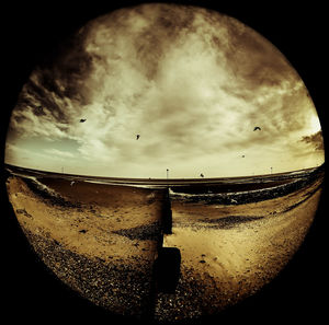 View of sea seen through window