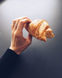 Close-up of hand holding ice cream