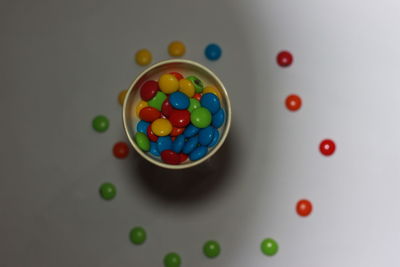 High angle view of multi colored balls on table