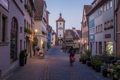 Illuminated buildings against sky