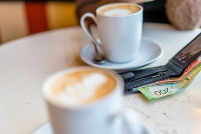 Close-up of russian currency roubles on table in cafe