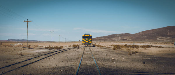 View of railroad tracks on desert