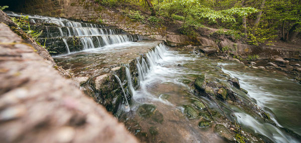 View of waterfall in forest