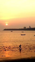 Scenic view of sea at sunset