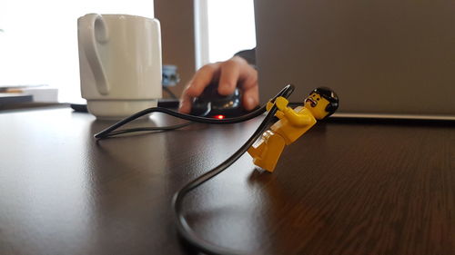 Close-up of man working on table