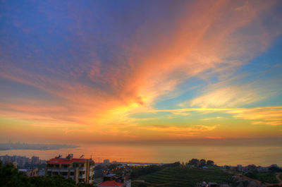 Scenic view of sea against sky at sunset