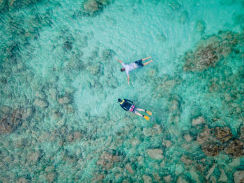 High angle view of person swimming in sea