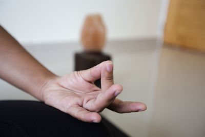 Cropped hand of woman holding ice cream