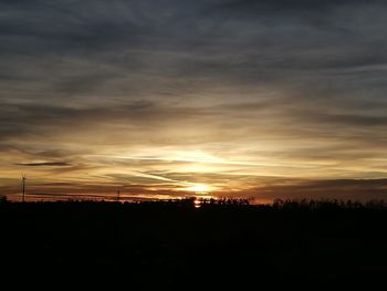 Scenic view of dramatic sky during sunset