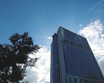 Low angle view of modern building against sky