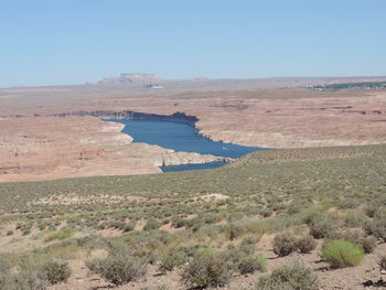 Scenic view of desert against clear sky