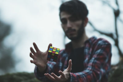 Close-up of man holding hands