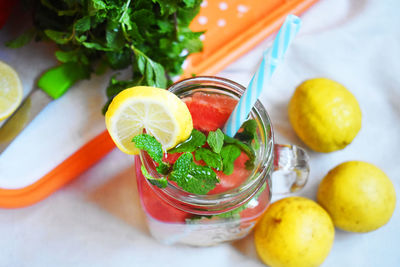 Fruits in glass on table
