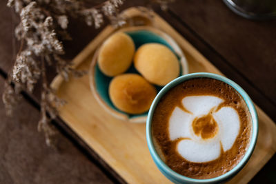 High angle view of coffee on table