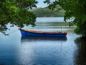 Boat moored in lake