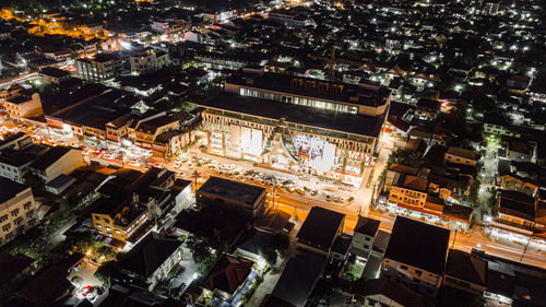 High angle view of illuminated buildings in city