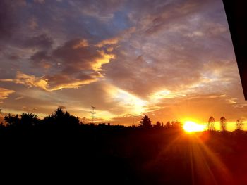 Sun shining through clouds