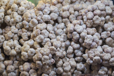 Full frame shot of onions for sale at market stall