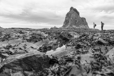 Scenic view of rock formations against sky