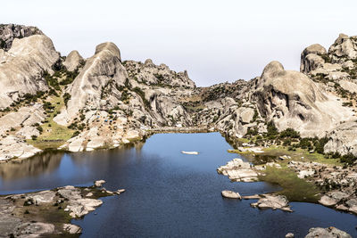 Scenic view of rock formations against sky