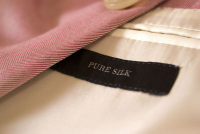 Pink silk. black label. silk label.