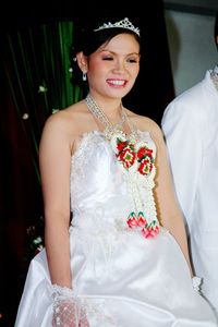 Portrait of smiling young woman wearing mask