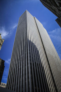 Low angle view of modern building against sky