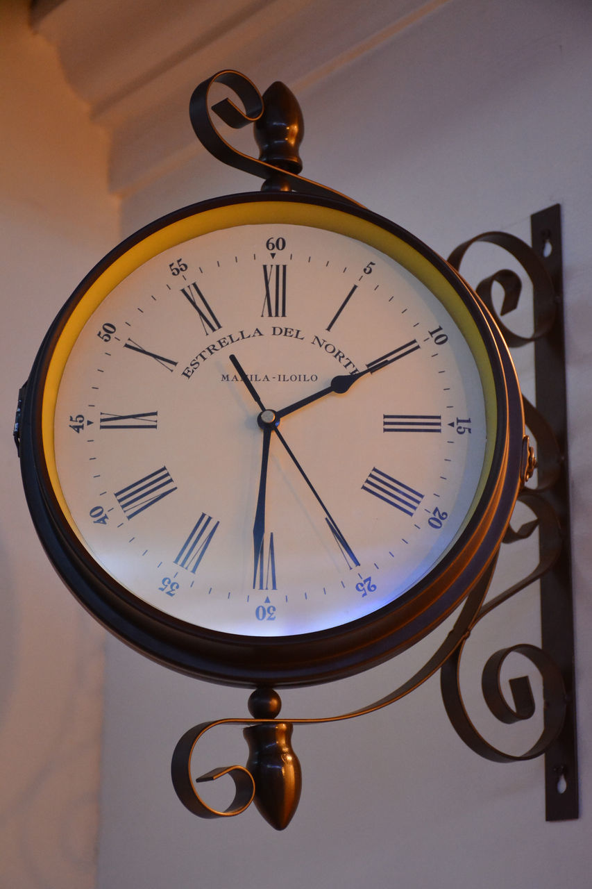 LOW ANGLE VIEW OF CLOCK