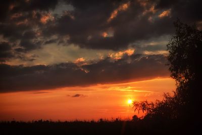 Scenic view of dramatic sky during sunset